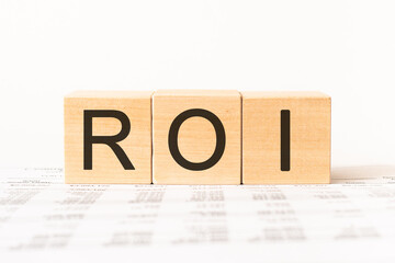 word ROI, Return On Investment, made with wood building blocks, stock image