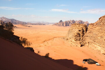 Fototapeta na wymiar Deserted landscape View of the Wadi Rum desert, rocks mountain and dunes, Jordan
