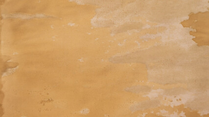 Old brown paper texture. Yellow autumn watercolor texture with abstract washes and brush strokes on the white paper background. Chaotic abstract organic design.