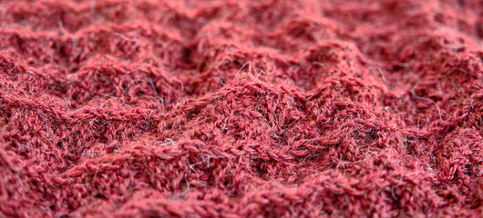 Hand-knitted wool coral fabric