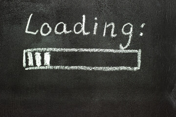The loading process is shown in white on a chalkboard. Stop motion animation.