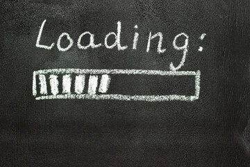 The loading process is shown in white on a chalkboard. Stop motion animation.