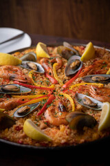 authentic paella on wooden board