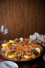 authentic paella on wooden board