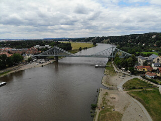 Obraz premium Aerial view of Loschwitz Bridge (blue wonder), a cantilever truss bridge over the river Elbe which connects the city districts Loschwitz and Blasewitz in Dresden, Saxony, Germany.
