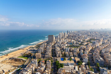 Fototapeta na wymiar View of the Mediterranean coast and the city of Bat Yam and Tel Aviv from a high skyscraper. Panorama. Israel. Summer.