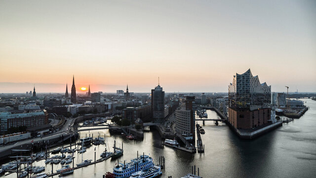 Scenic view Hamburg cityscape and Elbe River at sunset, Germany