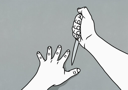 Man playing the knife game