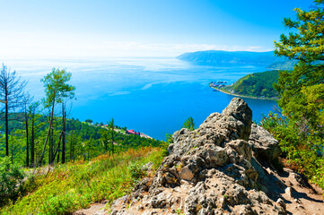 Looking over the Angara River and Lake Baikal from the Chersky Peak in the Listvyanka village. 