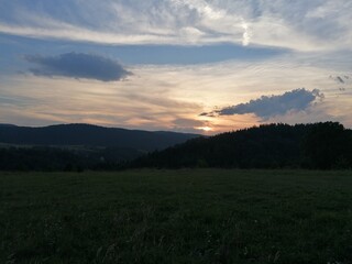 Fototapeta premium sunset over the mountains