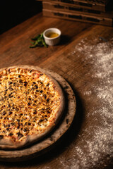 Delicious pizza in wood table