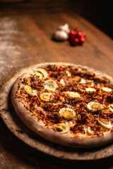 Delicious pizza in wood table