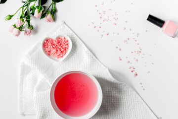 salt and cream for nail care in spa top view