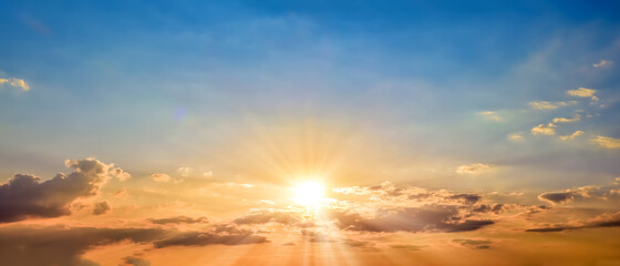 Beautiful blue summer sky with bright sun at sunset as a background - obrazy, fototapety, plakaty