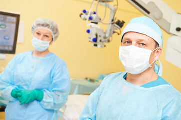 doctor ophthalmologist surgeon in operation room