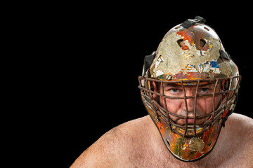 Defender. Portrait of a brutal man in a protective mask