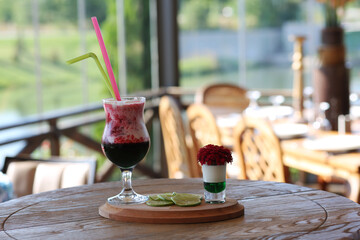 red cocktail on the table