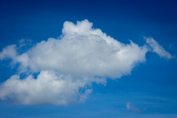 Naklejka na ściany i meble White clouds in blue sky background.