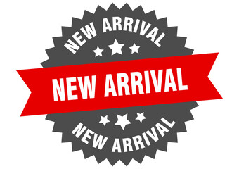 Obraz premium new arrival round isolated ribbon label. new arrival sign