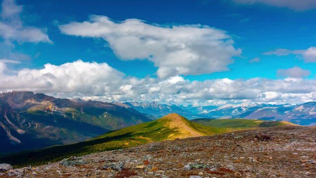 Summit view of Time Lapse video in 4K of a rocky mountain trail view in Banff National Park, Edith Cavell trailhead, Jasper Summit Of Franchire Peak Range 180 Rotation Time Lapse 4K