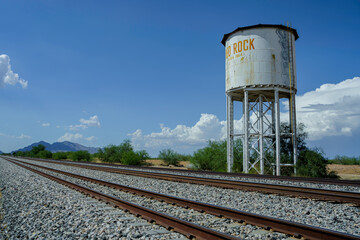 An Old Water Tank Alongside Railroad Tracks in Southern Arizona