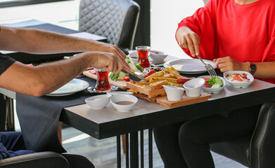 young couple having breakfast
