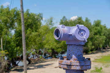 Old Industrial Steel Side Outlet Elbow Pipe for Natural Gas Pipeline along the Mississippi River in...