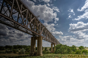 Fototapeta premium An old train trestle spans a long way in Texas 