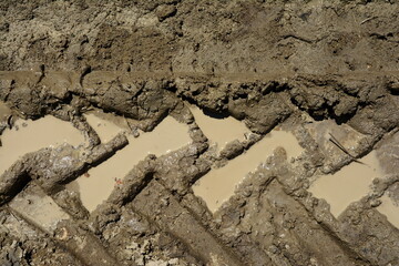 Wheel track on mud. abstract wheel trail background 