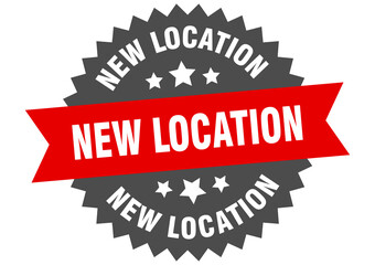 new location round isolated ribbon label. new location sign