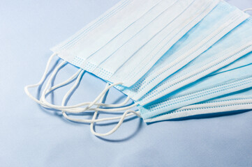 Background concept for news about the novel coronavirus COVID-19 pandemic, antiviral medical mask...