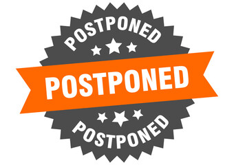 Fototapeta premium postponed round isolated ribbon label. postponed sign