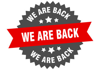 we are back round isolated ribbon label. we are back sign