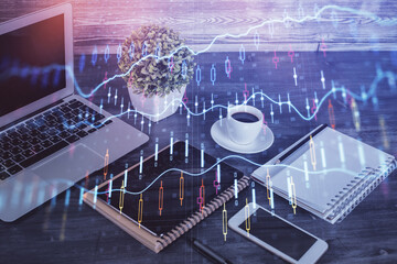 Double exposure of financial graph drawing and cell phone background. Concept of forex trading