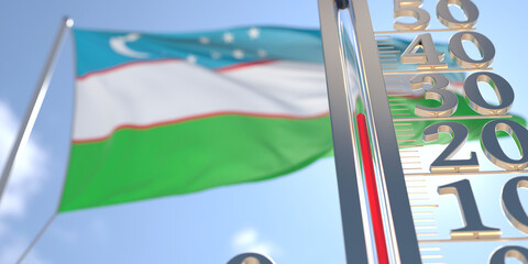 30 degrees centigrade on a thermometer measuring air temperature near flag of Uzbekistan. Hot weather forecast related 3D rendering