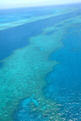 Fototapeta na wymiar Aerial View over the Great Barrier Reef from air, in Queensland, Australia.
