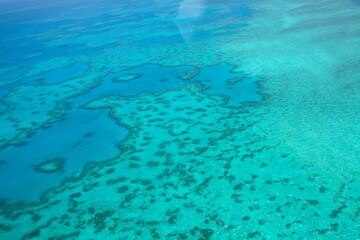 Aerial View over the Great Barrier Reef from air, in Queensland, Australia.
