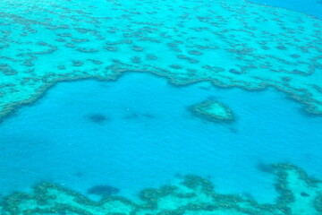 Fototapeta na wymiar Aerial View over the Heart Reef in the Great Barrier Reef from air, in Queensland, Australia.