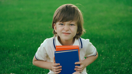 portrait of a boy with a book