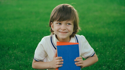 portrait of a boy with a book