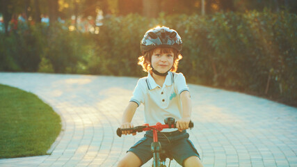 little boy riding a bike
