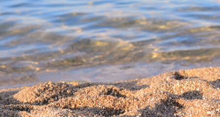 Golden Sand on the beach as background. Sand Texture. Golden sand. Background from fine sand.