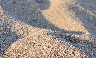 Golden Sand on the beach as background. Sand Texture. Golden sand. Background from fine sand.