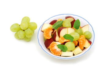 Bowl with fresh fruits salad isolated on white