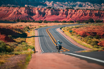 Biker driving on the Highway on legendary Route 66, Arizona. Panoramic picture of a scenic road,...
