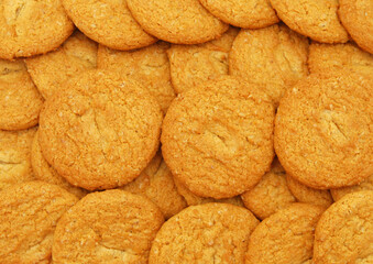 Three homemade oatmeal cookies isolated on background