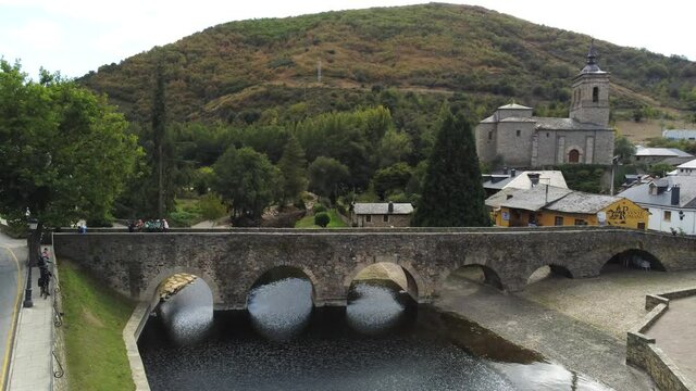 Camino de Santiago. Bridge of pilgrims in Molinaseca. Village in El Bierzo. Leon,Spain Aerial Drone Footage. 