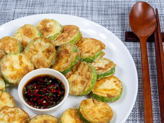 Korean food : Hobakjeon. Zucchini sliced, flour-coated, and pan-fried in egg batter.