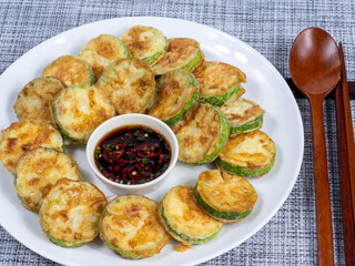 Korean food : Hobakjeon. Zucchini sliced, flour-coated, and pan-fried in egg batter.