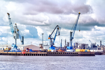 Containers, docks and cranes in the port of hamburg